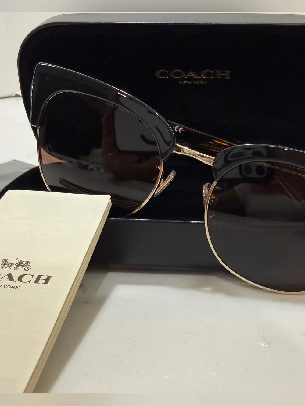 Coach Black Frame Sunglasses with Gold Trim and Brown Lenses